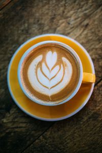 Close-up of cappuccino on table