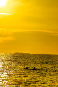 Scenic view of sea at sunset