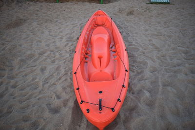 High angle view of red boat on beach