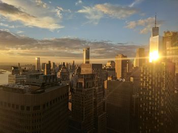 Cityscape against sky during sunset