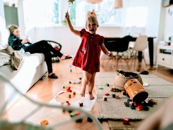 Portrait of girl dancing at home