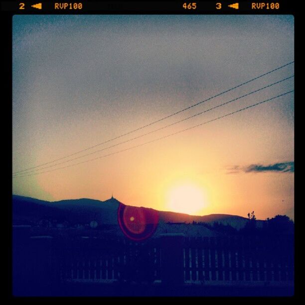 sunset, transfer print, power line, sky, auto post production filter, silhouette, orange color, electricity pylon, electricity, power supply, cable, scenics, low angle view, power cable, nature, beauty in nature, connection, no people, built structure, tranquil scene