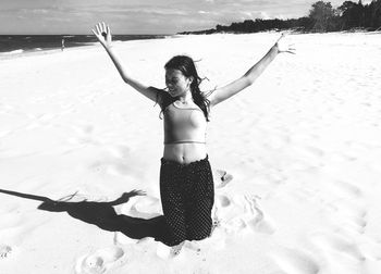 Full length of woman on beach