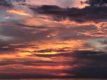 Low angle view of dramatic sky during sunset