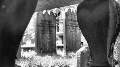 Close-up of cross at cemetery