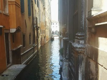 View of canal along buildings