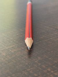 High angle view of red pencils on table