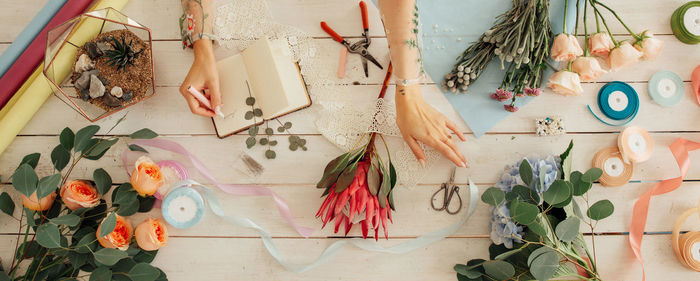 High angle view of various flowers on table