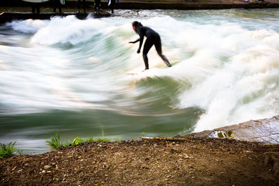 Man surfing in sea