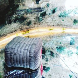 High angle view of rocks by sea