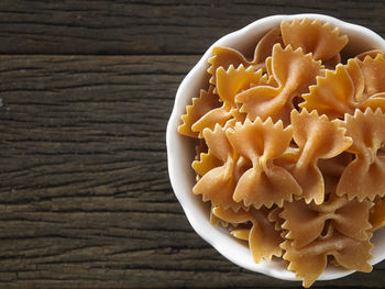 Close-up of farfalle pasta on table