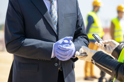 Low angle view of men working