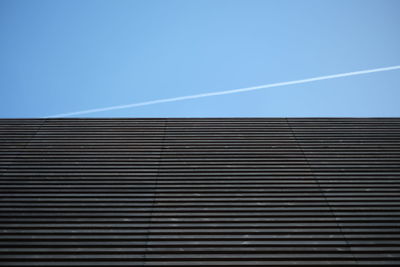 Low angle view of built structure against blue sky