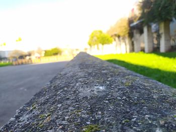 Surface level of concrete wall against sky