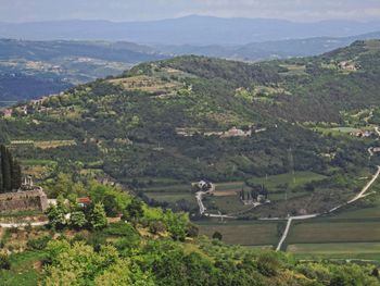 Scenic view of landscape against mountains