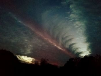 Low angle view of dramatic sky at sunset