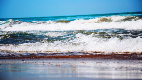 Scenic view of sea against clear sky