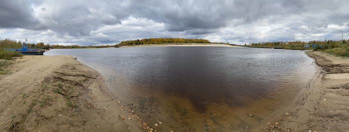 Panoramic view of beach against sky