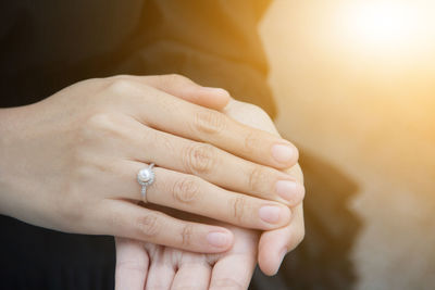 High angle view of hands