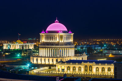 Grozny. illuminated building against sky at night