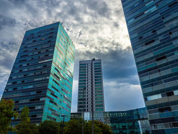 Low angle view of skyscrapers against sky