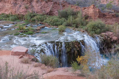 Stream flowing through rocks