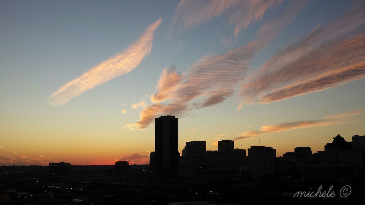 VIEW OF CITYSCAPE AT SUNSET