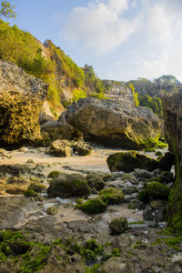 Scenic view of rocks against sky