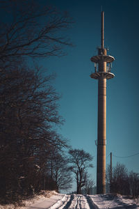 Low angle view of street light against sky