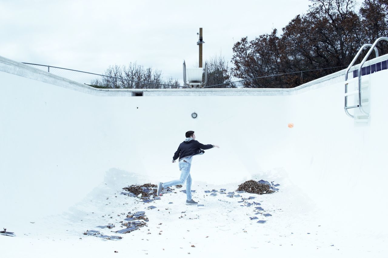 winter, cold temperature, snow, weather, nature, real people, day, outdoors, men, one person, sky, water slide, water park