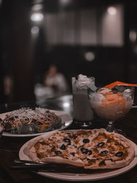 Close-up of ice cream in glass on table