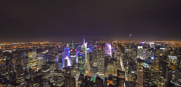 Illuminated cityscape at night