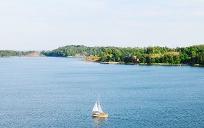 Boats sailing in sea