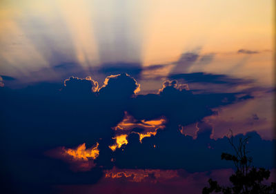 Low angle view of dramatic sky during sunset