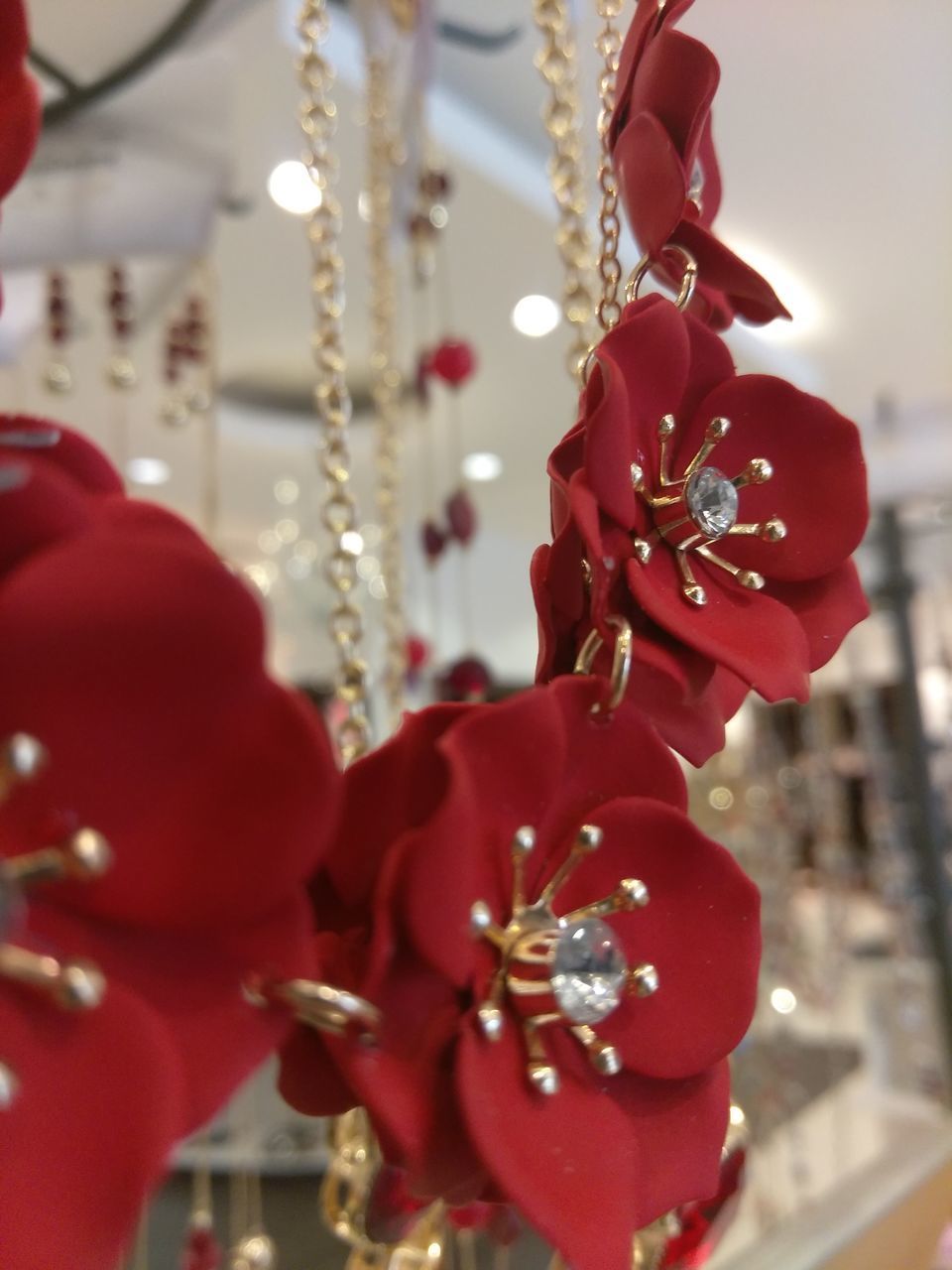 CLOSE-UP OF CHRISTMAS DECORATIONS HANGING ON TREE