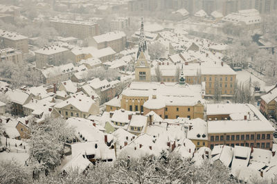 High angle view of houses in town during winter