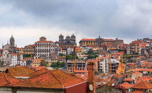 Buildings in city against sky