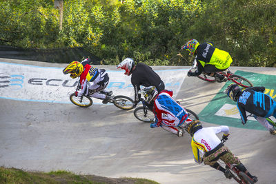 High angle view of cyclists racing on track