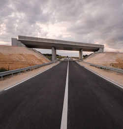 View of road against cloudy sky