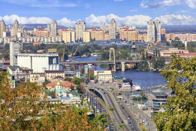 High angle view of river amidst buildings in city