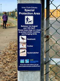 Warning sign on a fence