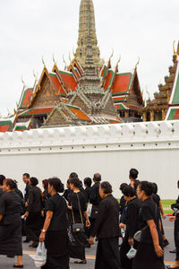 Group of people outside temple