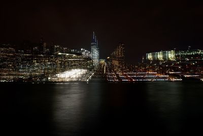 Illuminated cityscape at night