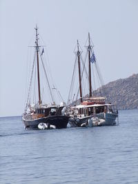 Boats sailing in sea