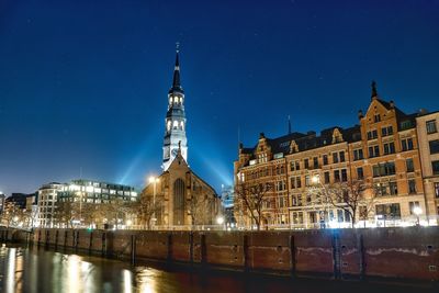 View of illuminated city at night