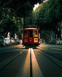 Train on street in city