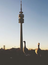 View of communications tower against clear sky