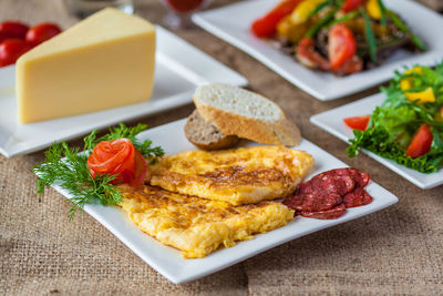 Close-up of breakfast served on table