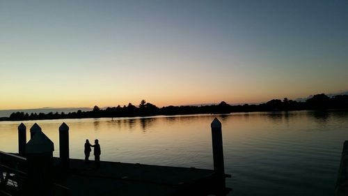 Scenic view of sea at sunset