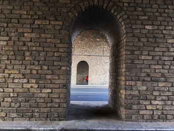 Archway of brick wall